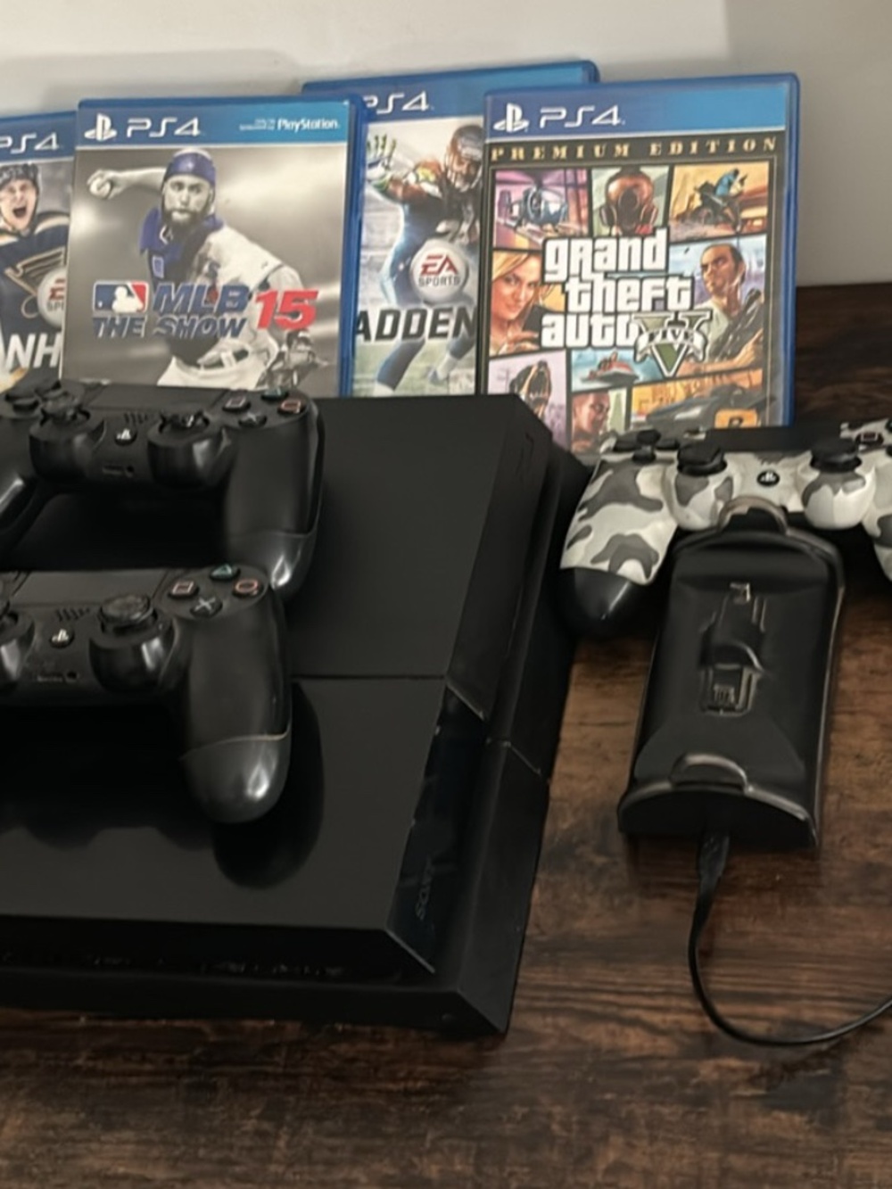 Sony Playstation 4 + games, controllers and charging station